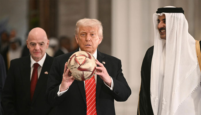 World football chief Gianni Infantino (left) is seen with US President Donald Trump. —AFP/File
