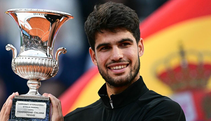 Carlos Alcaraz with a trophy.— AFP/File