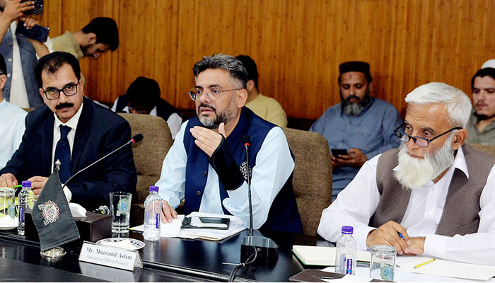 Adviser to Chief Minister for Finance Muzzammil Aslam (centre), and Special Assistant to CM for Industries Abdul Karim Khan (right) are participating in the pre-budget consultation meeting at Sarhad Chamber of Commerce on May 22, 2025. — NNI