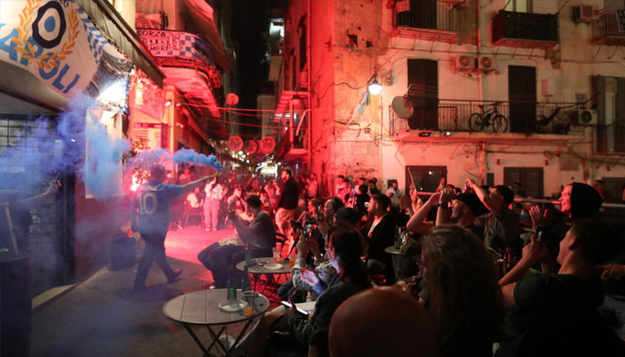 Napoli fans seen celebrating. — AFP/File