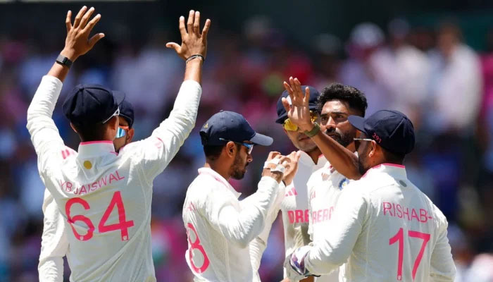 Indian pacer Mohammed Siraj celebrates after taking the wicket of Usman Khawaja during the fifth Border-Gavaskar Trophy Test against Australia at the Sydney Cricket Ground (SCG) on January 05, 2024. — AFP