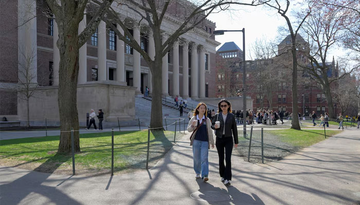 People walk on the campus of Harvard University in Cambridge, Massachusetts, US, April 15, 2025. —Reuters