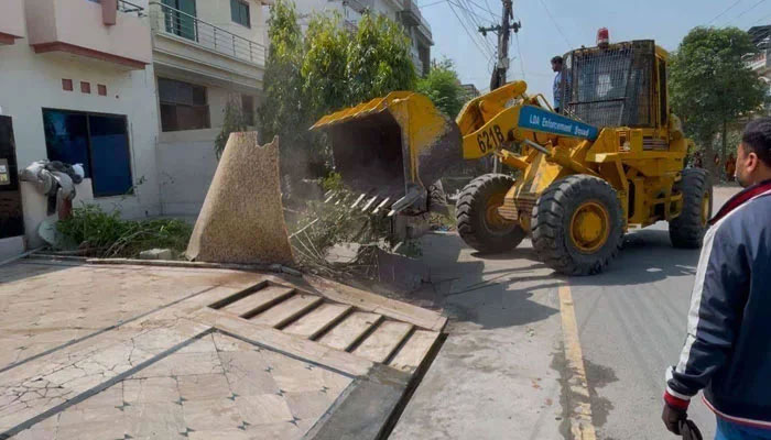 This image shows LDA personnel conducting an anti-encroachment operation on April 14, 2025. — Facebook@Lahore Development Authority