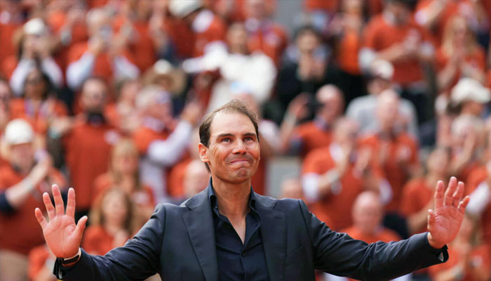 Rafael Nadal waves to the Court Philippe Chatrier crowd. —AFP/File