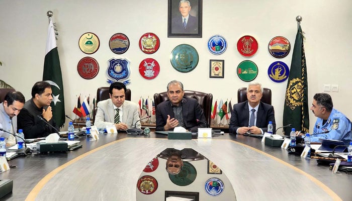 Interior Minister Mohsin Naqvi (centre) chairing a high-level meeting in Islamabad on May 25, 2025. — PPI