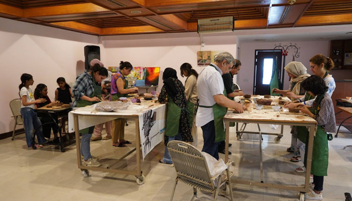 Participates participate in a pottery workshop titled ‘The Art of Pottery’ hosted by the Pakistan National Council of the Arts (PNCA) on May 24, 2025. — Facebook@PNCAOfficial