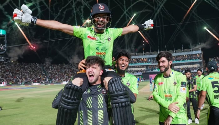 Lahore Qalandars players carry teammate Sikandar Raza as they celebrate after their victory in the PSL X final match between Lahore Qalandars and Quetta Gladiators at the Gaddafi Stadium in Lahore on May 25, 2025. — X/@thePSLt20
