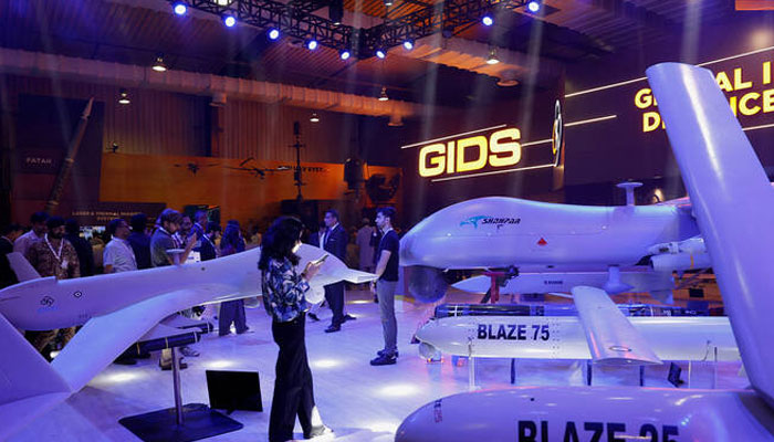 Visitors inspect the Global Industrial & Defence Solutions (GIDS) unmanned combat aerial vehicle (UCAV) Shahpar during the International Defence Exhibition and Seminar (IDEAS 2024) in Karachi, Pakistan, on November 21, 2024. — Reuters