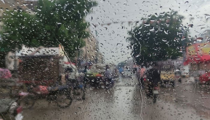 A representational image showing raindrops on a car window. — Geo News/File
