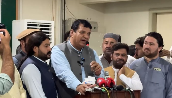 Federal Minister for SAFRON, Kashmir and Gilgit-Baltistan Affairs Amir Muqam addresses a ceremony on the occasion of Youm-e-Takbir held in Peshawar on May 28, 2025. — Screengrab via Facebook@AmirMuqamAM.