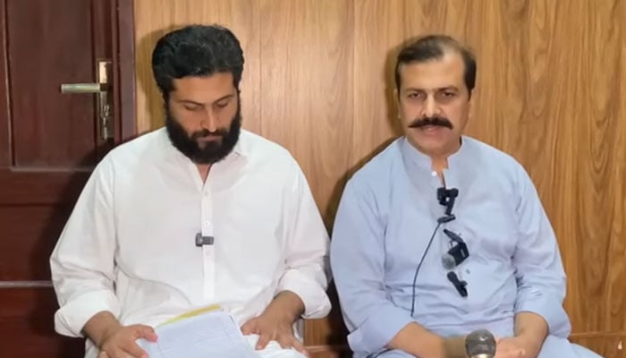ANP district president and former MPA Shakeel Khan Umarzai (right)  speaks during a press conference on May 29, 2025. — Screengrab via Facebook@Bashir Khan Qilla