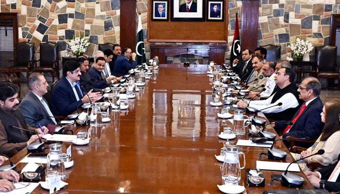Sindh Chief Minister Syed Murad Ali Shah and Federal Minister for Maritime Affairs Junaid Anwar meet with their respective teams at the CM House on May 29, 2025. — Facebook@SindhCMHouse