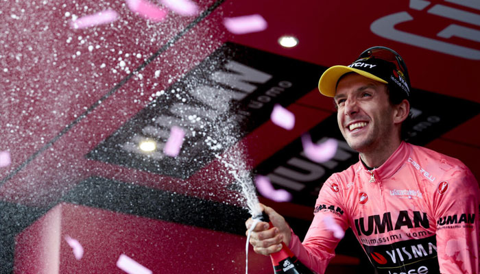 Simon Yates celebrates after effectively winning the Giro dItalia on Saturday. —AFP/File