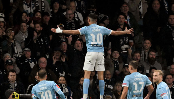 Yonatan Cohen celebrates after scoring the goal which secured Melbourne Citys victory in the A-League grand final against Melbourne Victory. —AFP