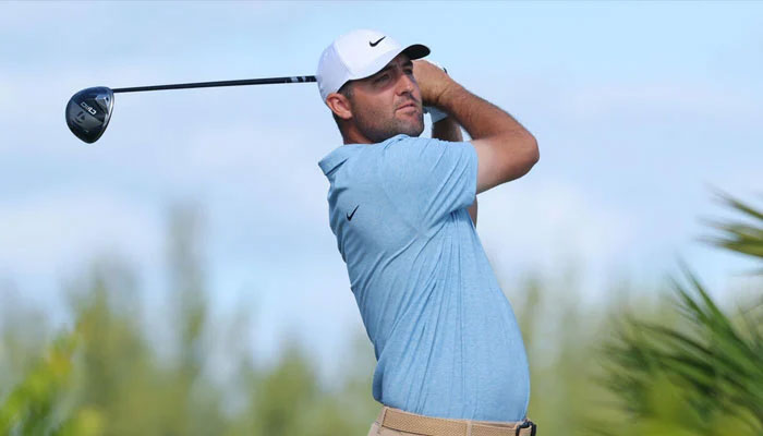 Top-ranked Scottie Scheffler in position after hitting a shot. — AFP/File