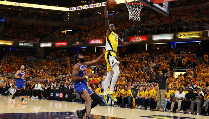Pascal Siakam of the Indiana Pacers dunks against Mitchell Robinson in the Pacers victory over the New York Knicks to win the NBA Eastern Conference finals. —AFP/File