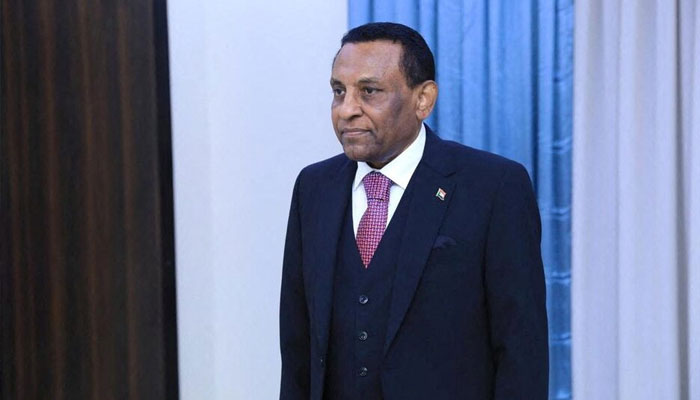 Former UN official Kamil Idris is sworn in, as Sudans new prime minister in front of Sudan army chief, Abdel Fattah al-Burhan (not pictured) in Port Sudan, Sudan, May 31, 2025.—Reuters