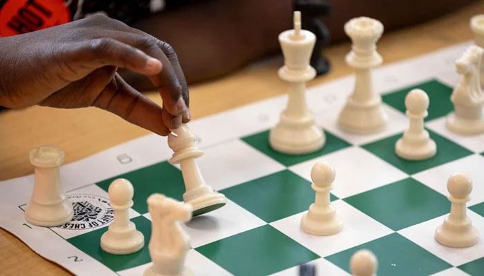 A player plays tournament chess on July 15, 2023, in Portland, Maine. — AFP