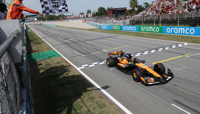 McLarens Oscar Piastri stands after finish line in Spanish Grand Prix. —AFP/File