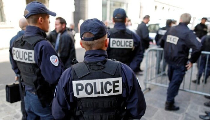 This representational image shows French police gathered outside a local police station in Paris, France. — Reuters/File