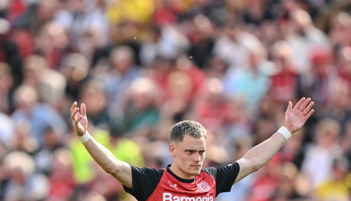 Florian Wirtz reating during match. —AFP/File