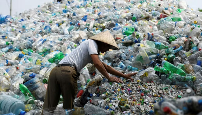A dump for used plastic bottle in Hanoi, Vietnam. — AFP/File