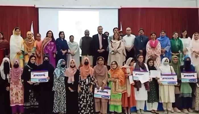 Participants pose for a group photo during the 2nd All Pakistan Inter-University Idea Fest 2025, organised by the Rawalpindi Women University (RWU) on June 4, 2025. — Screengrab via Facebook@rawalpindiwomenuniversity