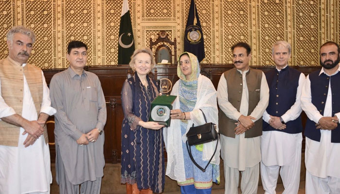 Deputy Speaker Suraiya Bibi (centre right) presents a shield to the Ambassador of Austria to Pakistan, Andrea Wicke (centre left), during his visit to the Khyber Pakhtunkhwa Assembly on June 4, 2025. — Facebook@pakpgov
