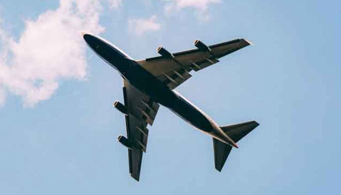 A passenger carrier plane in the air. —The News/Files