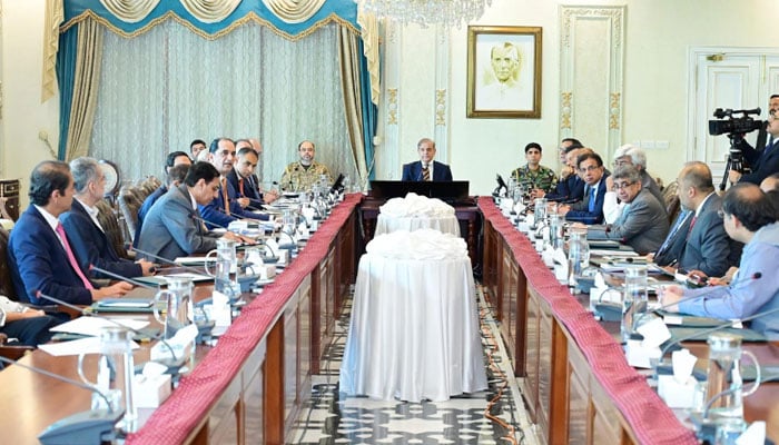 Prime Minister Shehbaz Sharif (right) chairs a meeting on National Tariff Policy on May 16, 2025. — PID