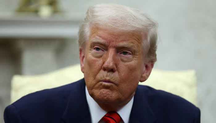 US President Donald Trump reacts as he meets Nato Secretary-General Mark Rutte (not pictured), in the Oval Office at the White House in Washington, DC, US, March 13, 2025. — Reuters