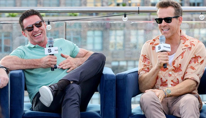 Hugh Jackman and Ryan Reynolds (right) have become co-owners of Australias SailGP team. — AFP/File