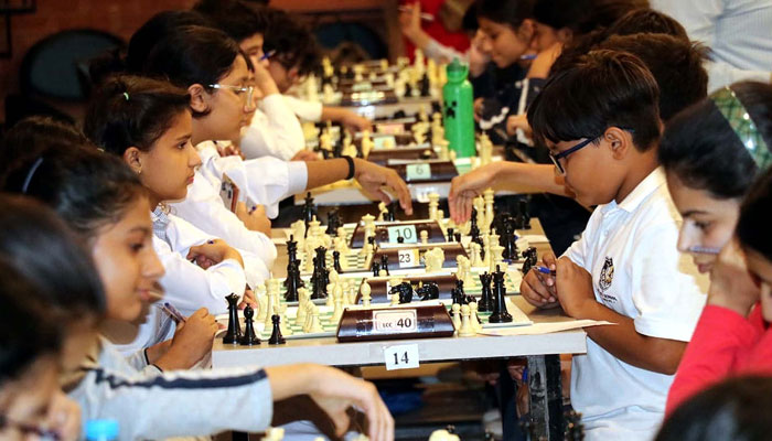 Student chess players participate in a chess competition on June 1, 2025. — PPI