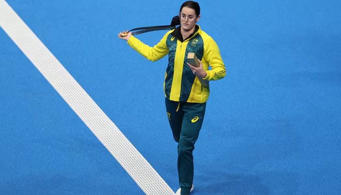 Gold medallist Kaylee McKeown of Australia with her medal after setting a new Olympic record. —Reuters/File