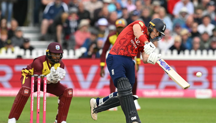 Englands Jacob Bethell hits a boundary during the second T20 against the West Indies in Bristol. —AFP/File