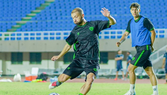 Pakistans Alamgir Ghazi (left) in action during their training session at the Jinnah Stadium in Islamabad on June 1, 2025. — PFF