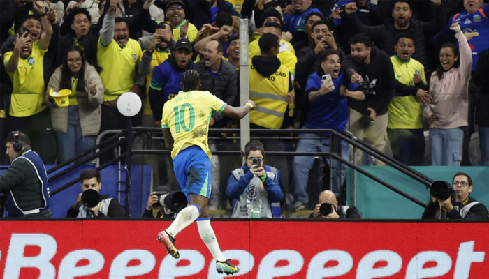 Brazil forward Vinicius Jr celebrates after scoring the goal that fired the five-time world champions into next years World Cup finals. —AFP/File