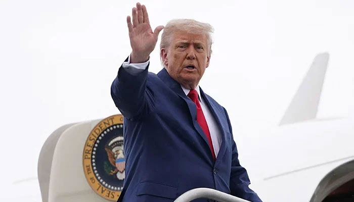 US President Donald Trump waves as he boards Air Force One to depart for Hagerstown, Maryland, at Morristown Municipal Airport in Morristown, New Jersey, US, June 8, 2025. — Reuters