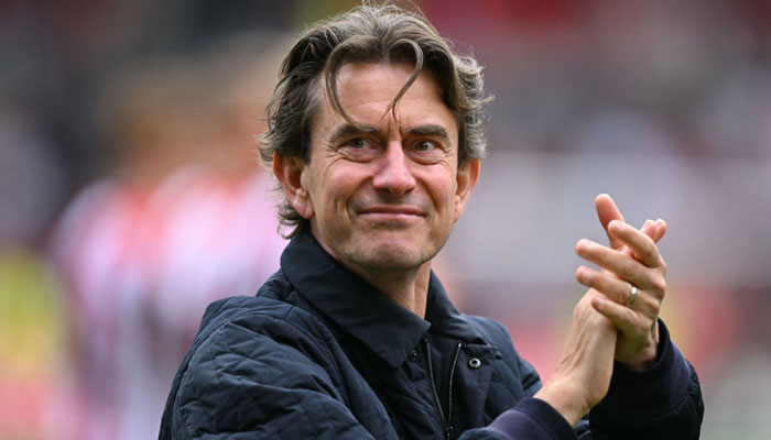 Brentfords Danish head coach Thomas Frank applauds fans on the pitch after the English Premier League football match between Brentford and Manchester United at the Gtech Community Stadium in London on May 4, 2025. — AFP