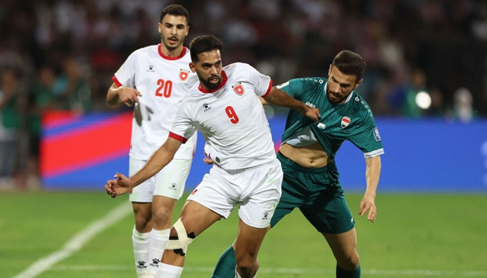 Jordans Ali Olwan in action with Iraqs Ali Faez during the World Cup AFC Qualifiers Group B match at Amman International Stadium, Amman June 10, 2025. — Reuters