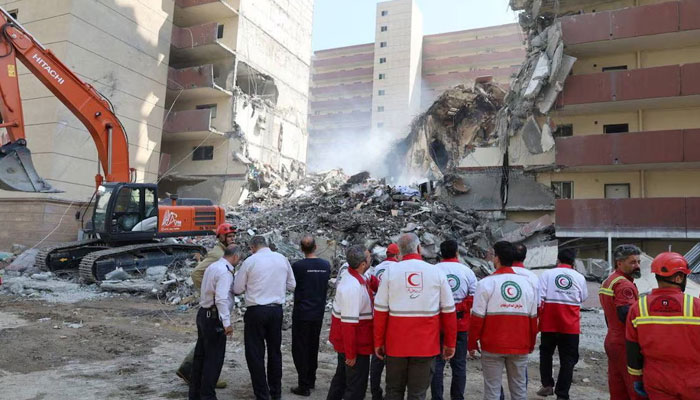 Rescuers work at the site of a damaged building, in the aftermath of Israeli strikes, in Tehran, Iran, June 13, 2025. — Reuters
