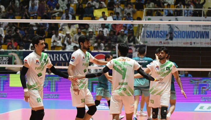 Pakistan volleyball team players interact during a match. — Facebook/Pakistan Volleyball Federation/File