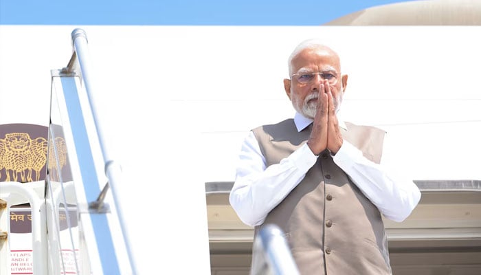Indias Prime Minister Narendra Modi gestures as he disembarks a plane upon arrival for a state visit at the Larnaca International Airport, in Larnaca, Cyprus June 15, 2025.—Reuters