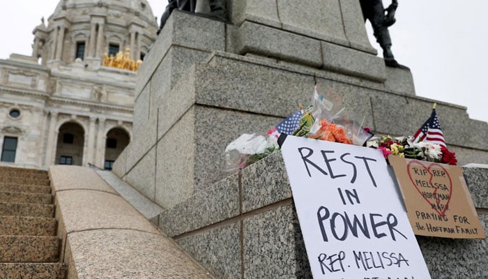 A small memorial for Democratic state assemblywoman Melissa Hortman and her husband Marc, who were fatally shot, is displayed outside the Minnesota State Capitol in St. Paul, Minnesota, on Saturday.—Reuters