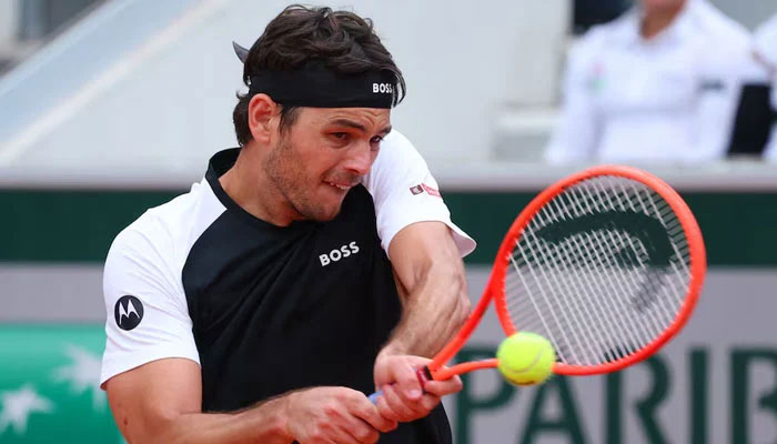 Taylor Fritz  in action during a tennis match on May 26, 2025. — Reuters