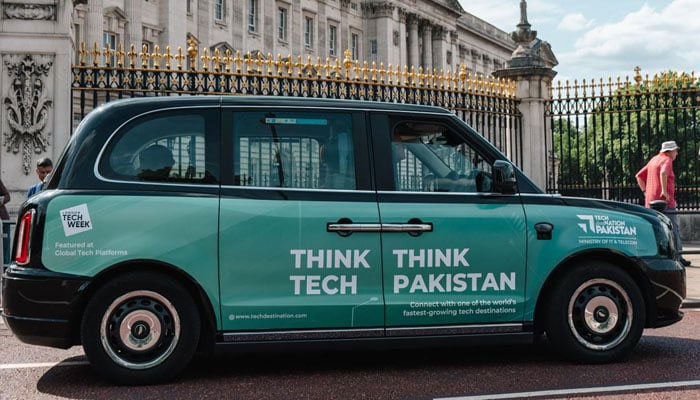 Black taxi parked in London with a message written on it, Think Tech, Think Pakistan. — Reporter/File