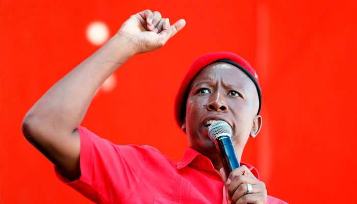 Julius Malema in his trademark red beret that has become synonymous with his party. —AFP/File