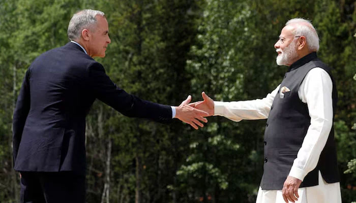 Canadian Prime Minister Mark Carney and Indias Prime Minister Narendra Modi shake hands before posing for a photo during the G7 Leaders Summit in Kananaskis, in Alberta, Canada, June 17, 2025. — Reuters
