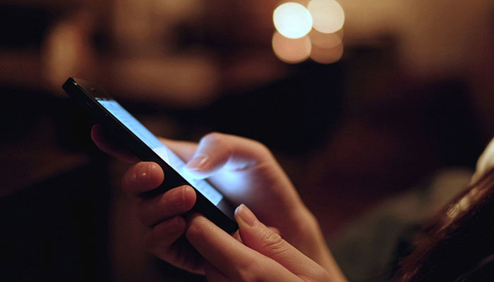 A person using smartphone. —TheNews/File