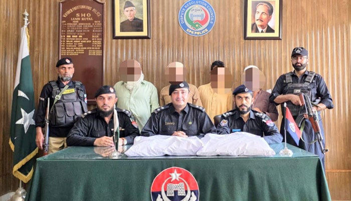Police officials are showing arrested alleged criminals and recovered seized crystal meth (Ice) to media persons during press conference in Landikotal on June 20, 2025. — Screengrab via Facebook@khyberpoliceofficial